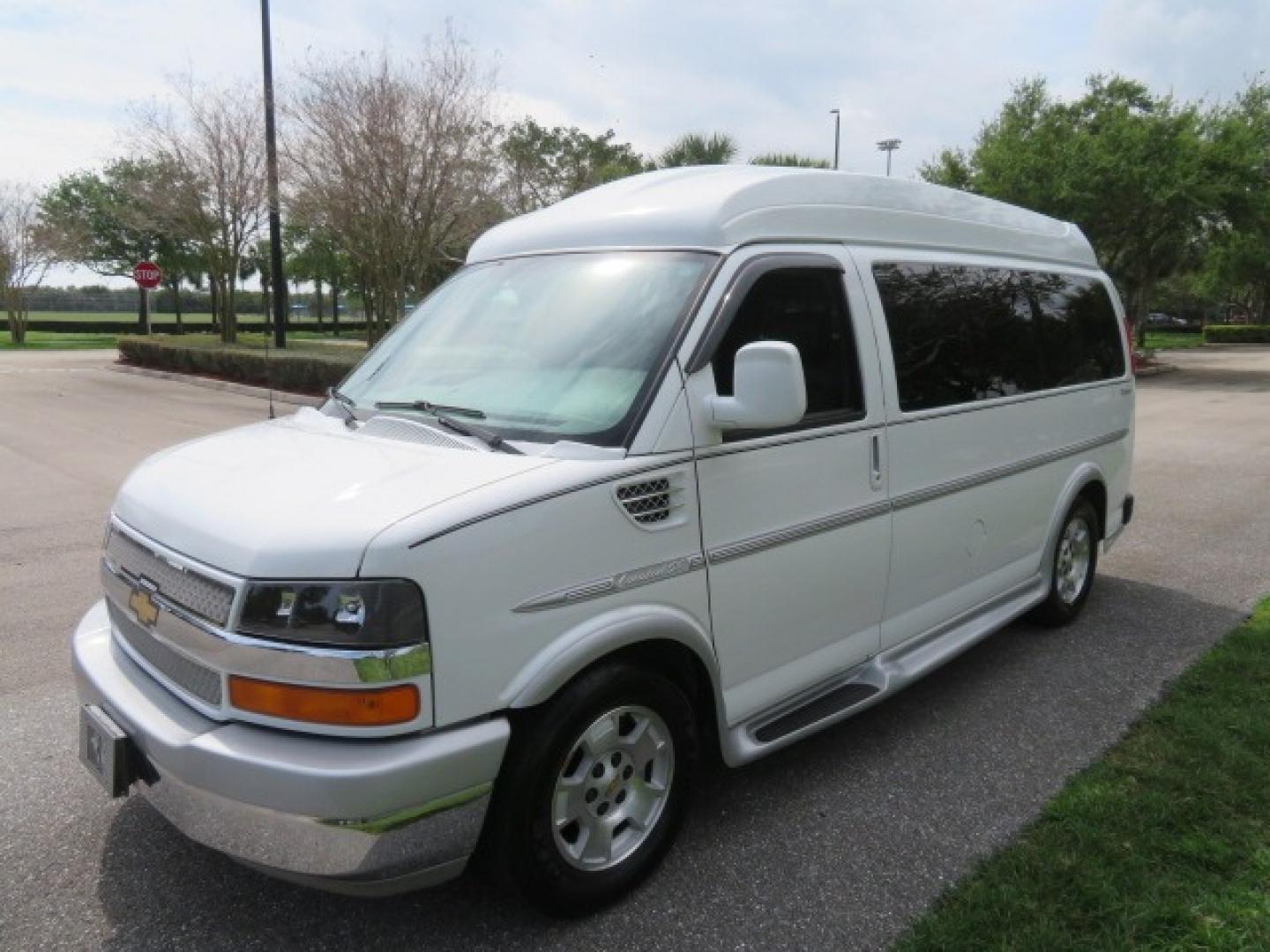 2010 White /Gray Chevrolet Express (1GNUGCD48A1) , located at 4301 Oak Circle #19, Boca Raton, FL, 33431, (954) 561-2499, 26.388861, -80.084038 - You are looking at a Gorgeous 2010 Chevy Express Handicap Wheelchair Conversion Van Explorer Limited SE with 31K Original Miles, Braun Century 750lb Side Entry Wheelchair lift, Tie Down System in the Floor, Rear Entertainment with Flat Screen TV/DVD, Leather Interior, Rear Power Folding Bench Seat/b - Photo#22